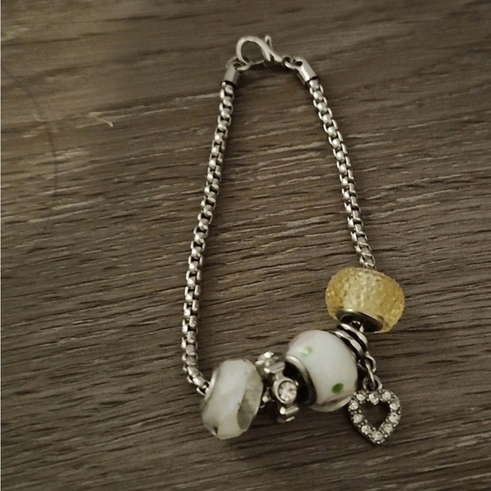 Elegant Silver and Yellow Charm Bracelet